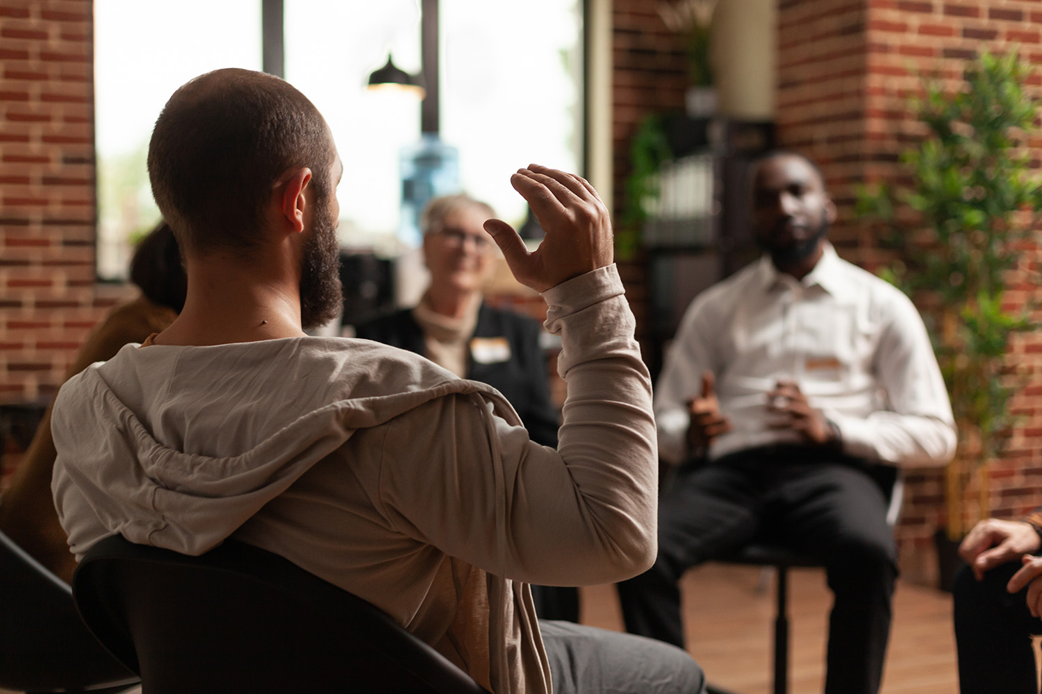 Man with addiction sharing mental health issues