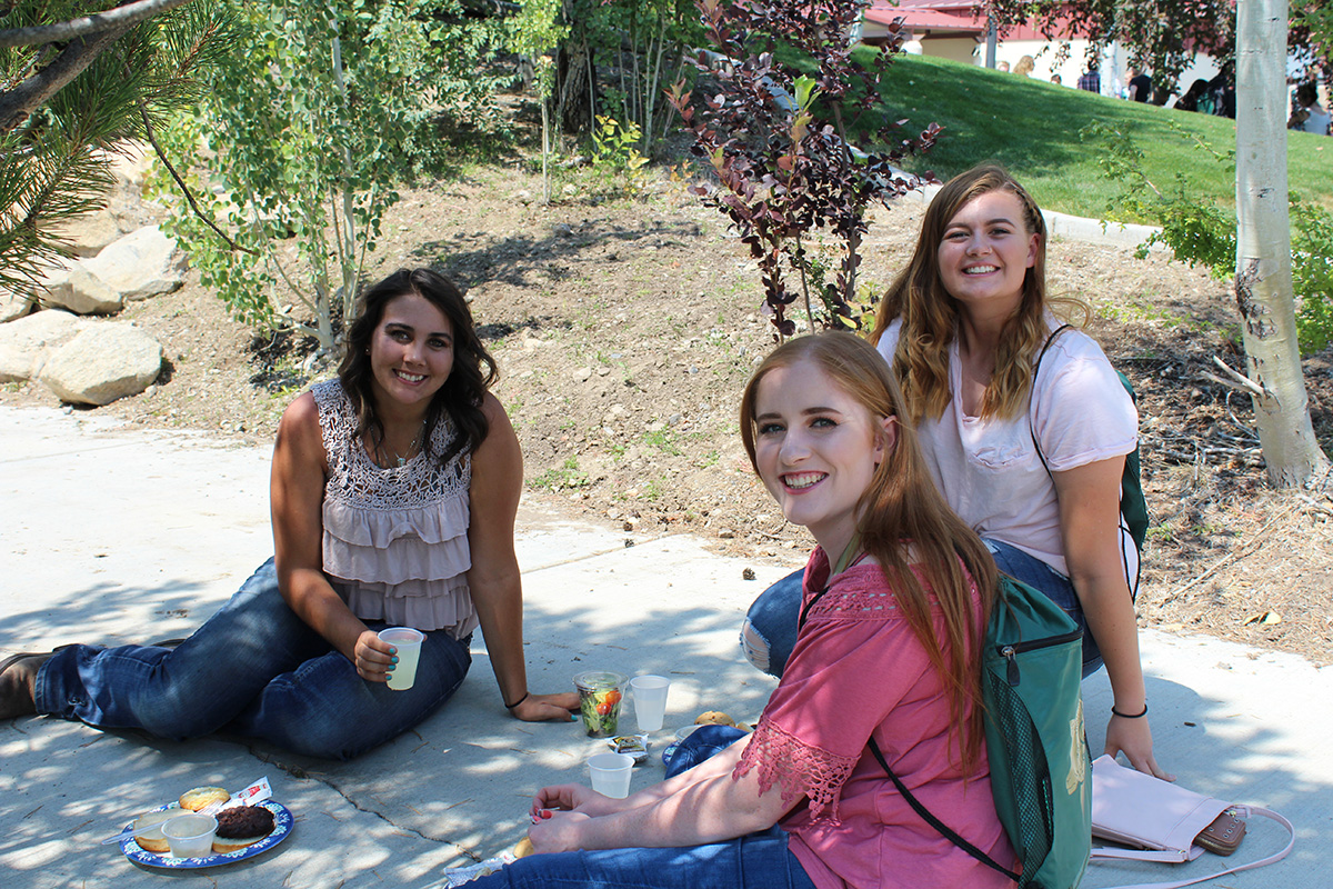 Social Science students sitting together on campus